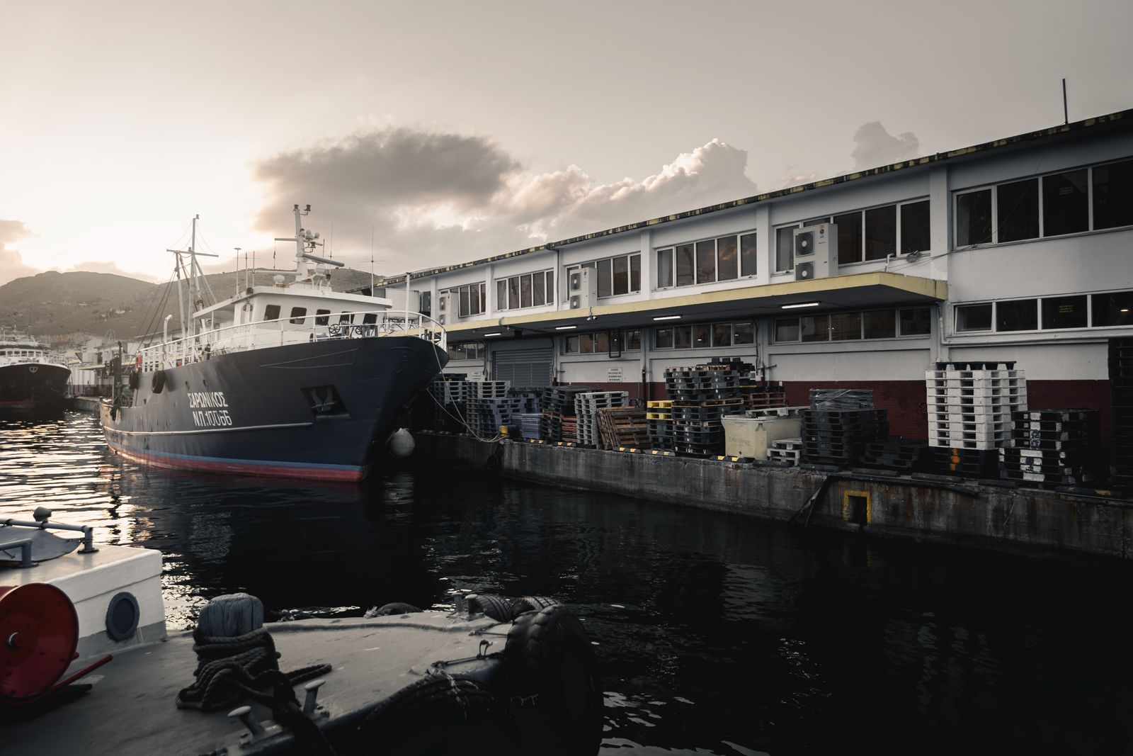 Cargo ship and freight at a commercial port for international shipping